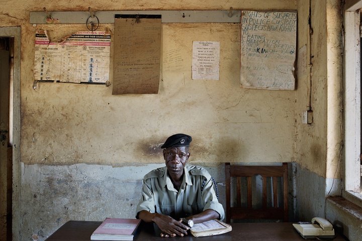 Police Constable # 11431 Ndalira John in Kakira Police Station, Jinja, Uganda, 2010