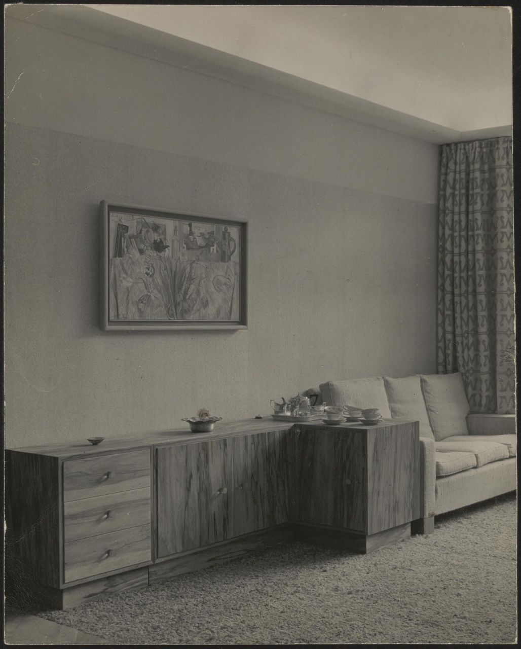 Afbeelding van woonkamer Redelé met buffet en bank